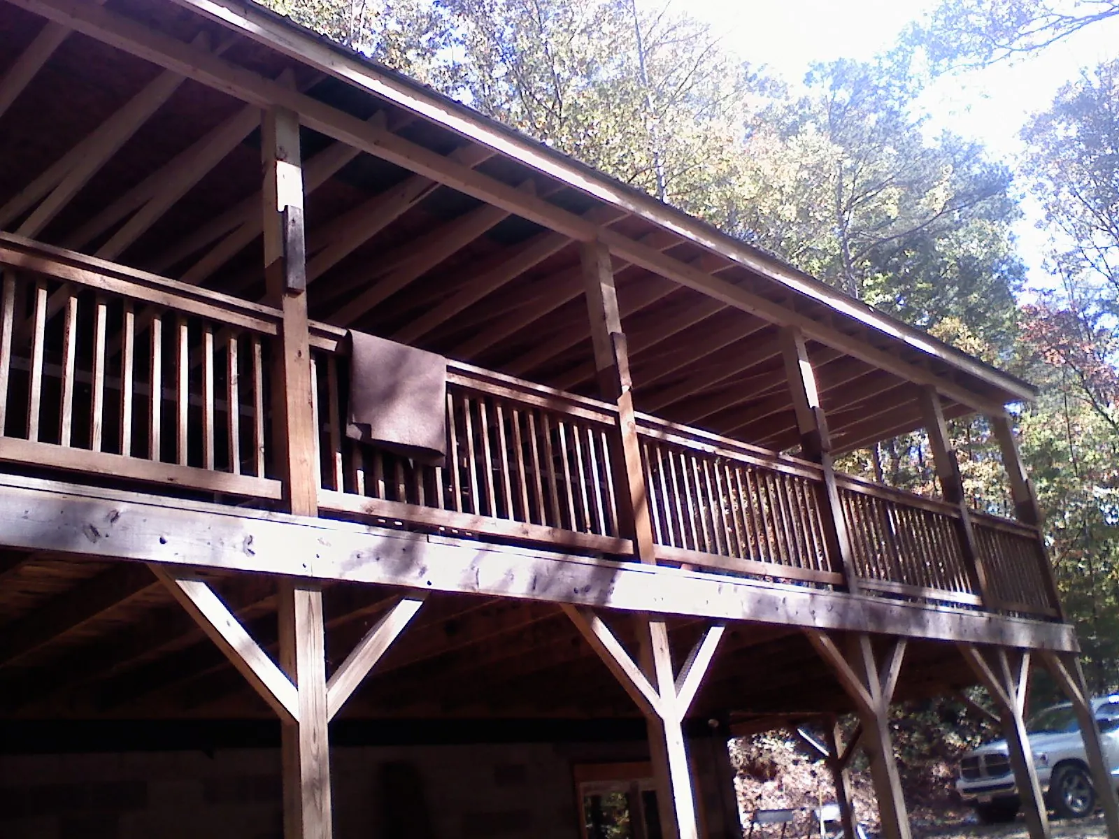 Timber framing under a new elevated porch and deck — Roof Leak Repair in Cary by Roofing Brothers